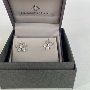Pave diamond floral 14K white gold earrings.